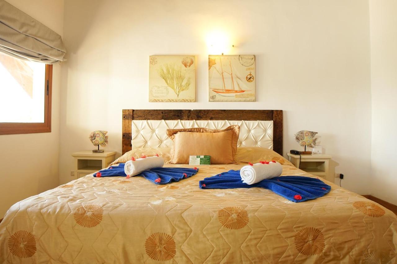 Sybaris Suites & Residences خوان دوليو المظهر الخارجي الصورة